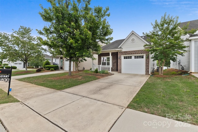 5076 Newport Lakes Dr, Rock Hill, SC 29732 - view of front of home with brick siding, a garage, driveway, and a front yard