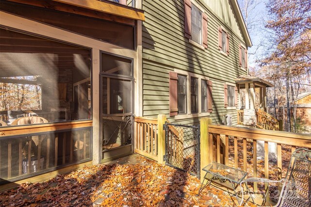 196 Juneberry Ln, Tuckasegee, NC 28783 - view of side of home with a sunroom