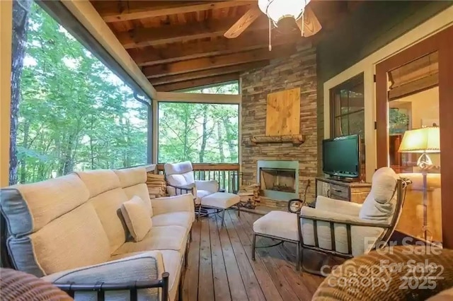 196 Juneberry Ln, Tuckasegee, NC 28783 - sunroom / solarium with an outdoor living space with a fireplace and ceiling fan