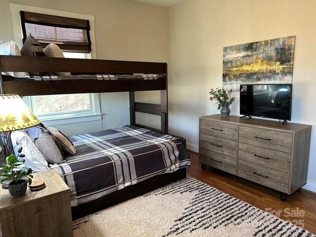196 Juneberry Ln, Tuckasegee, NC 28783 - bedroom featuring wood finished floors and baseboards
