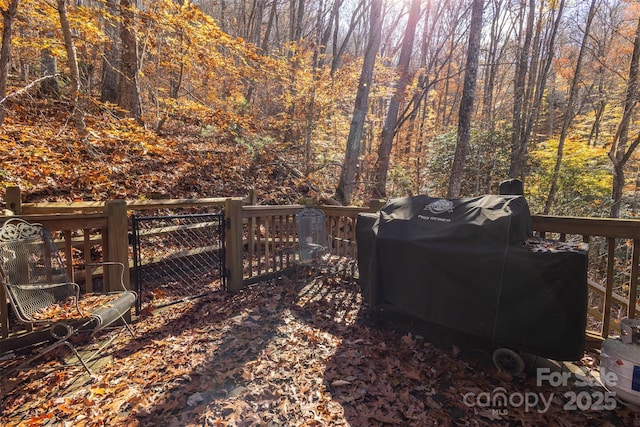196 Juneberry Ln, Tuckasegee, NC 28783 - deck with a wooded view