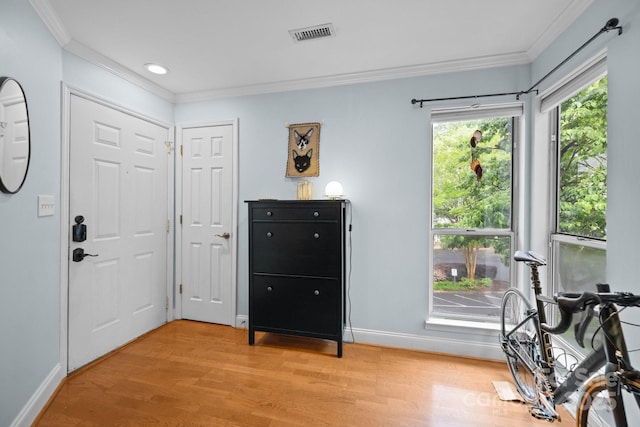 2502 Cranbrook Ln Unit 8, Charlotte, NC 28207 - entryway with ornamental molding, baseboards, light wood-style flooring, and recessed lighting