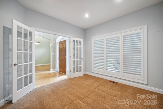 8216 Malibu Pointe Ln, Denver, NC 28037 - unfurnished room with french doors, carpet, baseboards, and recessed lighting