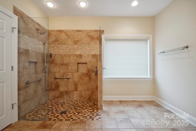 8216 Malibu Pointe Ln, Denver, NC 28037 - bathroom with a tile shower, recessed lighting, and baseboards