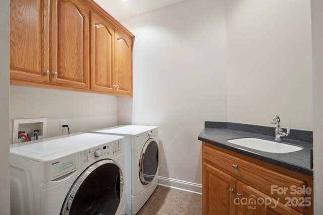 8216 Malibu Pointe Ln, Denver, NC 28037 - washroom with cabinet space, baseboards, independent washer and dryer, and tile patterned flooring