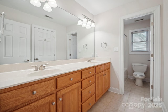 8216 Malibu Pointe Ln, Denver, NC 28037 - full bathroom featuring double vanity, tile patterned floors, toilet, and baseboards
