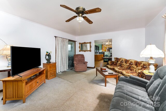 2556 Salem Church Rd, Lincolnton, NC 28092 - living area featuring a ceiling fan, light carpet, crown molding, and a chandelier