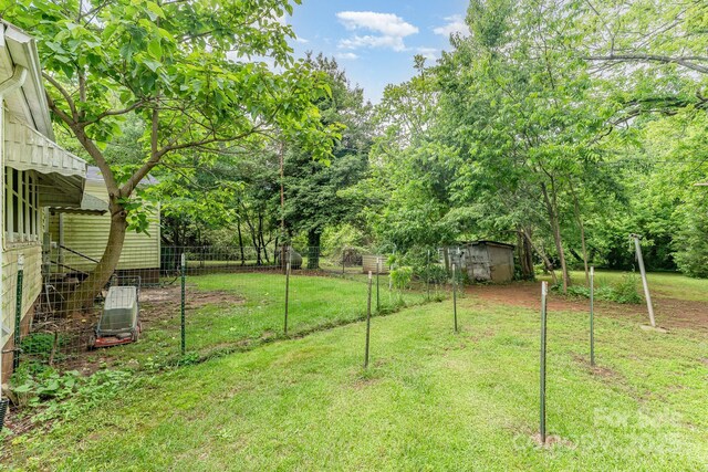 2556 Salem Church Rd, Lincolnton, NC 28092 - view of yard with a storage unit and an outdoor structure