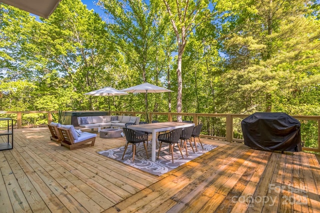 52 Reynolda Dr, Asheville, NC 28803 - wooden deck with area for grilling, outdoor dining area, and an outdoor living space with a fire pit