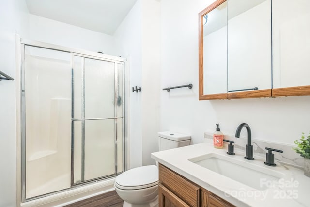52 Reynolda Dr, Asheville, NC 28803 - bathroom featuring toilet, a stall shower, and vanity