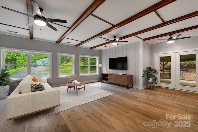 16 Arkansas Trl, Cullowhee, NC 28723 - living room featuring a ceiling fan, light wood-style floors, and baseboards