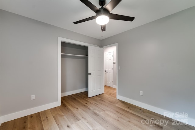 16 Arkansas Trl, Cullowhee, NC 28723 - unfurnished bedroom with baseboards, light wood-type flooring, a closet, and ceiling fan