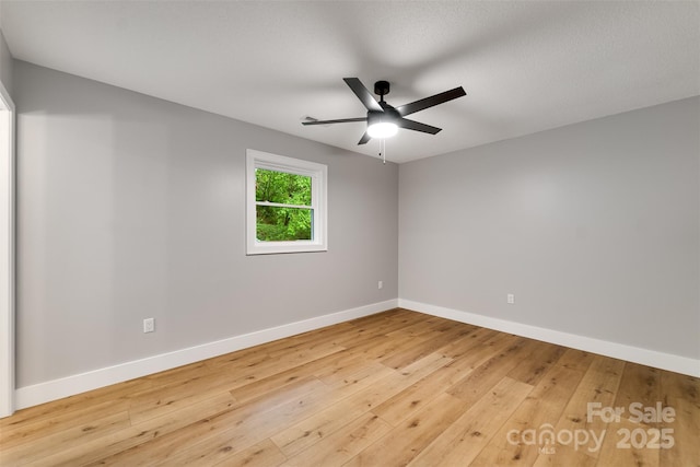 16 Arkansas Trl, Cullowhee, NC 28723 - unfurnished room featuring baseboards, wood-type flooring, and a ceiling fan