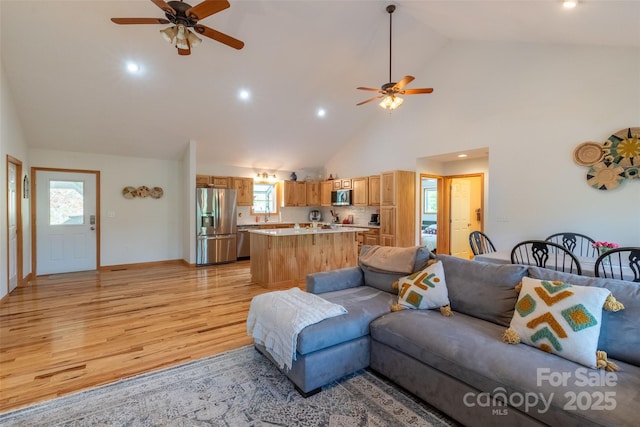 980 S River Rd, Sylva, NC 28779 - living area featuring ceiling fan, light wood-type flooring, plenty of natural light, high vaulted ceiling, and recessed lighting