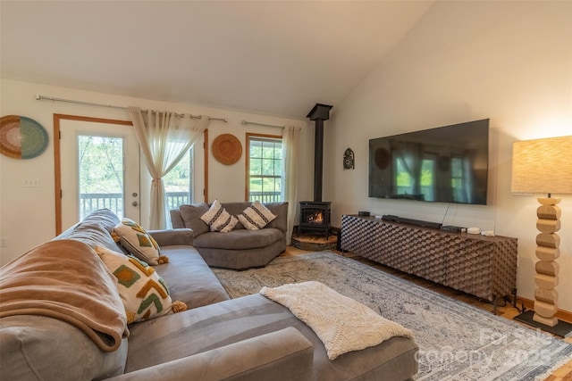 980 S River Rd, Sylva, NC 28779 - living area with a wood stove, lofted ceiling, and wood finished floors