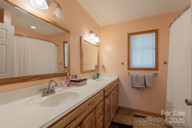 980 S River Rd, Sylva, NC 28779 - bathroom featuring double vanity, baseboards, and tile patterned flooring