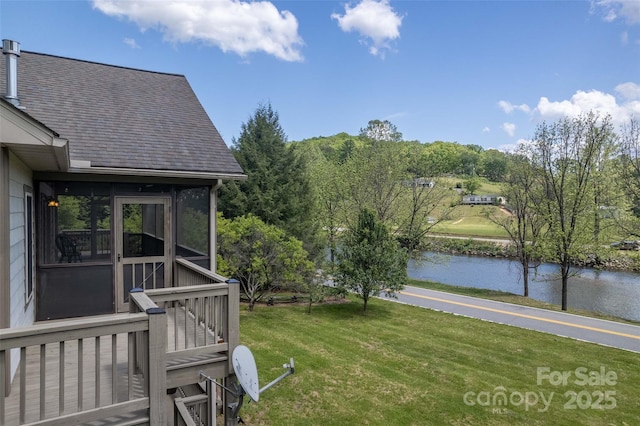 980 S River Rd, Sylva, NC 28779 - view of green lawn with a sunroom and a water view