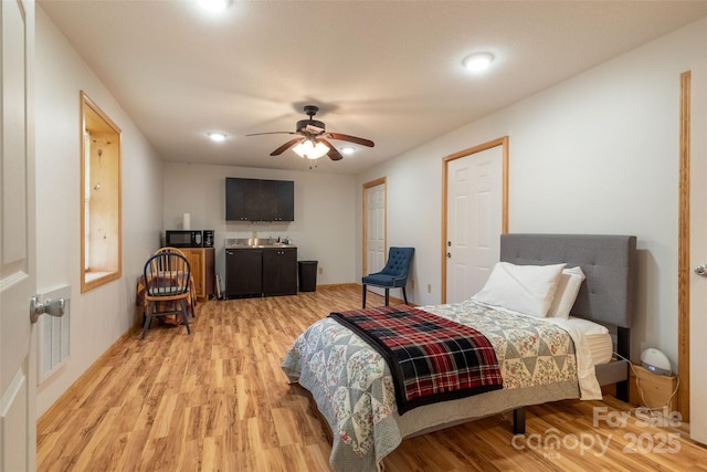 980 S River Rd, Sylva, NC 28779 - bedroom featuring light wood-style flooring, a ceiling fan, and recessed lighting