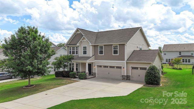 3211 Gilroy Dr, Fort Mill, SC 29707 - craftsman inspired home with driveway, a front lawn, stone siding, roof with shingles, and an attached garage
