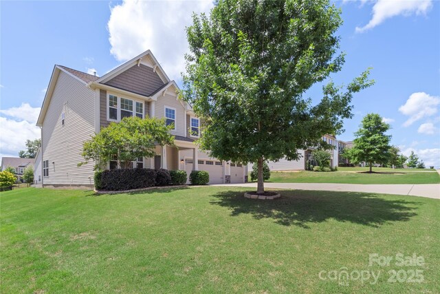 3211 Gilroy Dr, Fort Mill, SC 29707 - view of front of property featuring an attached garage, driveway, and a front lawn