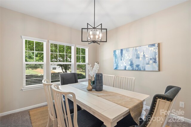 3211 Gilroy Dr, Fort Mill, SC 29707 - dining room with carpet flooring, a chandelier, and baseboards