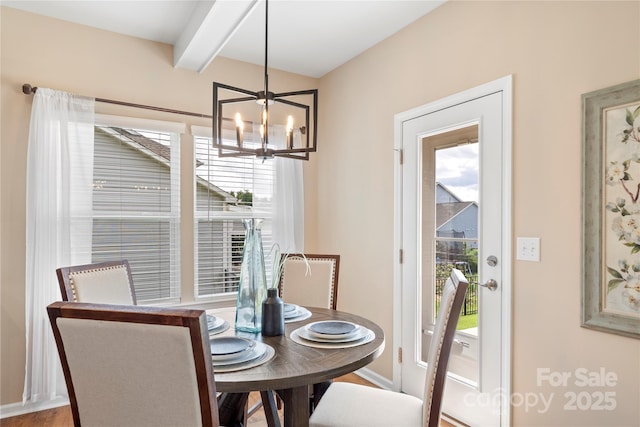 3211 Gilroy Dr, Fort Mill, SC 29707 - dining room with a chandelier, beamed ceiling, plenty of natural light, and baseboards