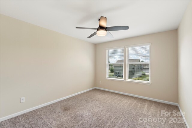 3211 Gilroy Dr, Fort Mill, SC 29707 - spare room with carpet, baseboards, and a ceiling fan