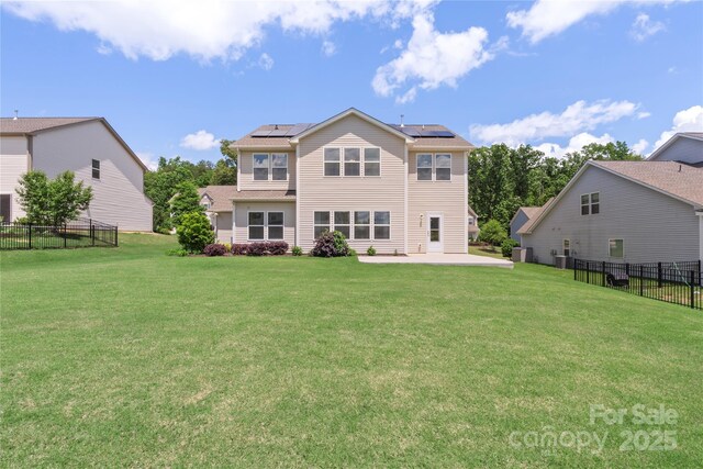 3211 Gilroy Dr, Fort Mill, SC 29707 - rear view of property featuring a patio area and roof mounted solar panels