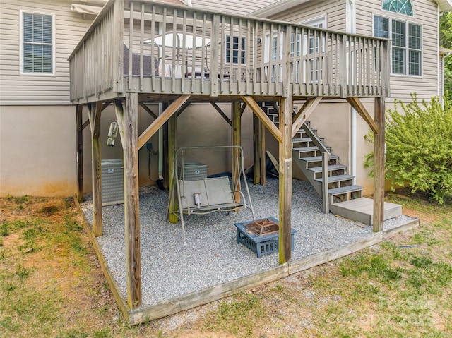 121 W Ashe Bridge Rd W, Marion, NC 28752 - view of patio / terrace featuring a fire pit, a wooden deck, and stairs