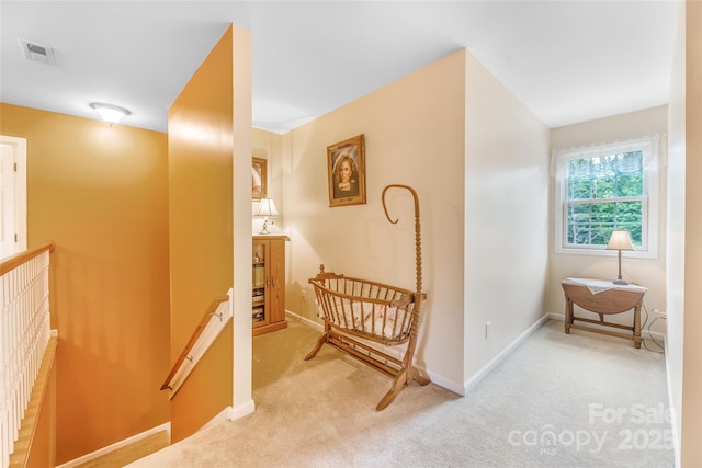 121 W Ashe Bridge Rd W, Marion, NC 28752 - hallway featuring an upstairs landing, light colored carpet, and baseboards
