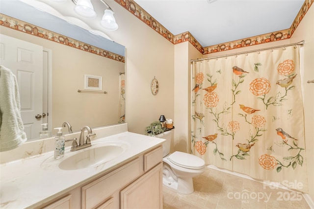 121 W Ashe Bridge Rd W, Marion, NC 28752 - bathroom featuring toilet, vanity, and tile patterned floors