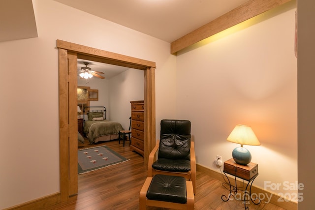324 Austin Mountain Dr, Burnsville, NC 28714 - sitting room with wood finished floors, ceiling fan, and baseboards