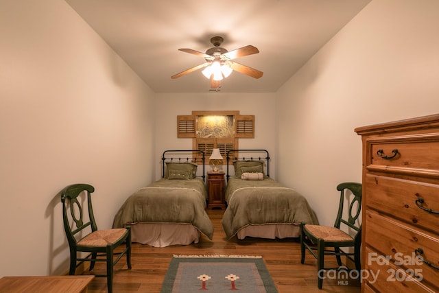324 Austin Mountain Dr, Burnsville, NC 28714 - bedroom with wood finished floors and a ceiling fan