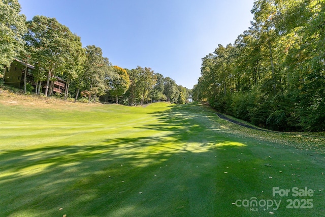 324 Austin Mountain Dr, Burnsville, NC 28714 - view of home's community with a lawn and view of golf course