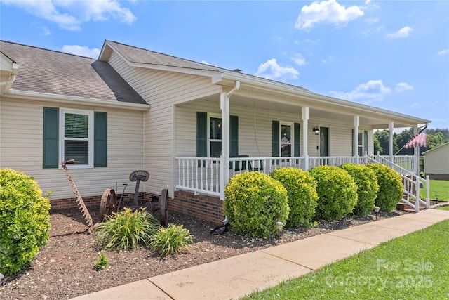 4916 Ritchie Rd, Lincolnton, NC 28092 - view of front of house with a porch and a shingled roof