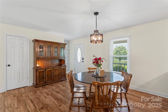 4916 Ritchie Rd, Lincolnton, NC 28092 - dining space featuring light wood-style flooring and baseboards