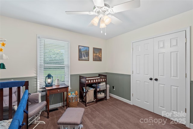 4916 Ritchie Rd, Lincolnton, NC 28092 - bedroom with wainscoting, carpet flooring, a closet, and ceiling fan