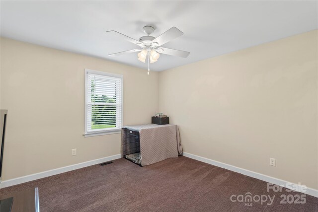 4916 Ritchie Rd, Lincolnton, NC 28092 - unfurnished office featuring a ceiling fan, baseboards, and dark carpet