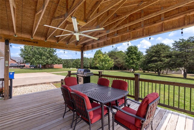 4916 Ritchie Rd, Lincolnton, NC 28092 - wooden terrace with a ceiling fan, area for grilling, a lawn, and outdoor dining area