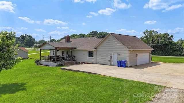 4916 Ritchie Rd, Lincolnton, NC 28092 - rear view of house with driveway, a lawn, a shingled roof, and a garage