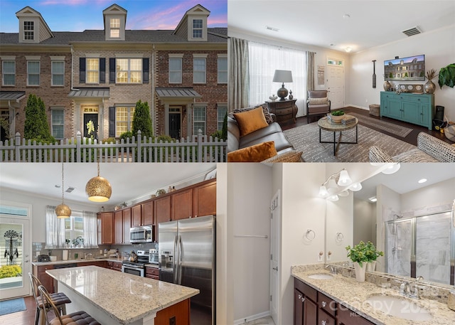 4313 Courtly Ln, Belmont, NC 28012 - kitchen featuring appliances with stainless steel finishes, a sink, open floor plan, light stone countertops, and a center island