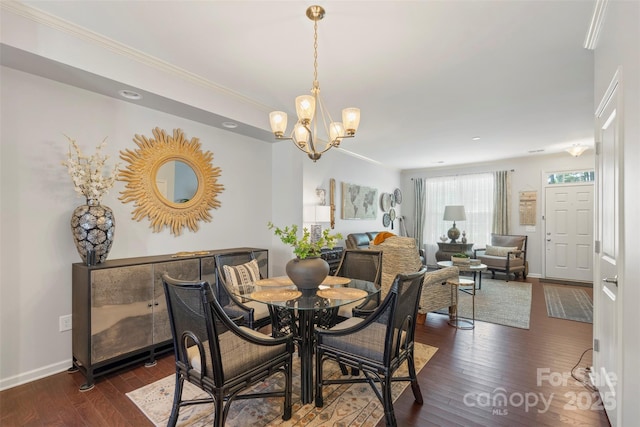 4313 Courtly Ln, Belmont, NC 28012 - dining space with crown molding, a chandelier, dark wood-style floors, and baseboards