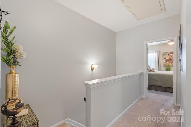 4313 Courtly Ln, Belmont, NC 28012 - hall with an upstairs landing, light carpet, and baseboards