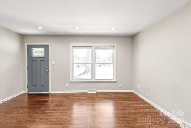 entrance foyer featuring wood finished floors, baseboards, and recessed lighting