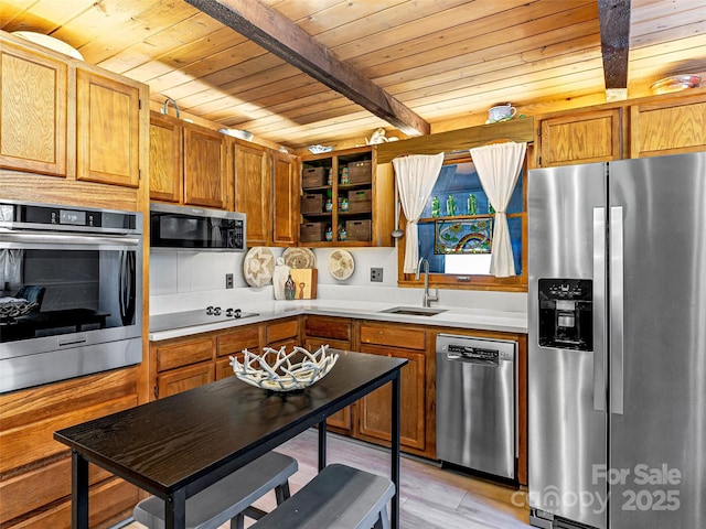 175 Village Ln, Mars Hill, NC 28754 - kitchen with stainless steel appliances, a sink, wood ceiling, beamed ceiling, and light wood-style flooring