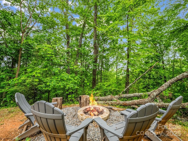 view of patio / terrace featuring a fire pit