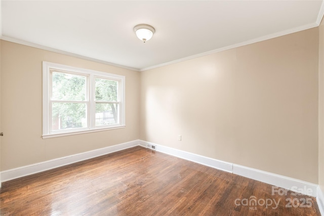 104 Willetta Dr, Charlotte, NC 28217 - unfurnished room with dark wood finished floors, ornamental molding, and baseboards