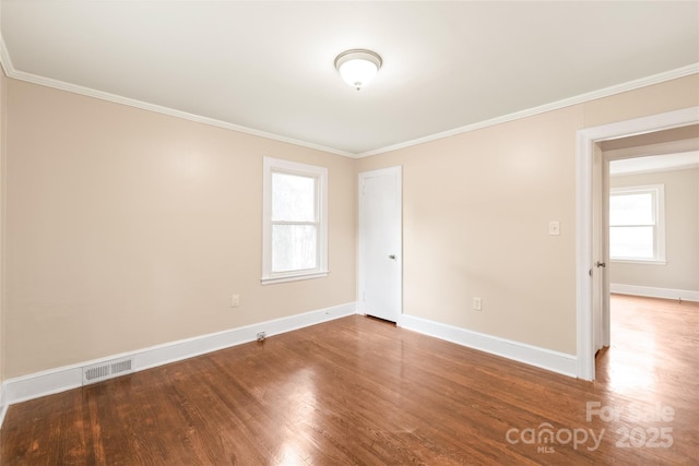 104 Willetta Dr, Charlotte, NC 28217 - unfurnished room featuring wood finished floors, crown molding, and baseboards