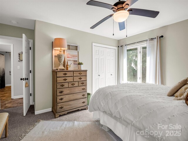 bedroom featuring light carpet, a closet, baseboards, and ceiling fan