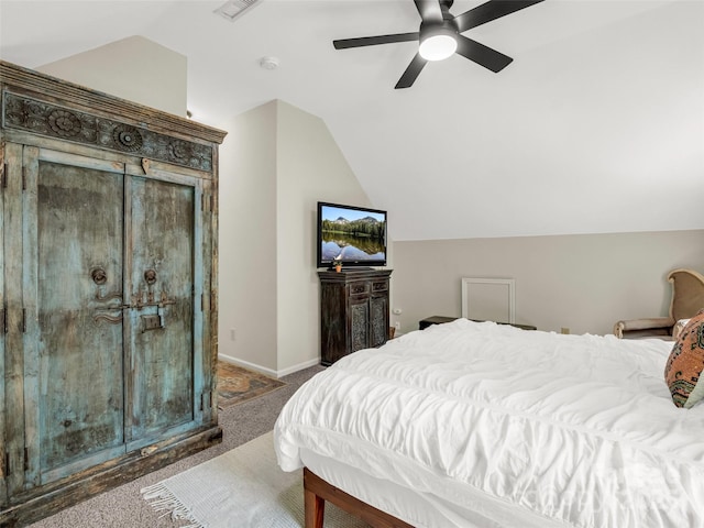 bedroom featuring carpet, vaulted ceiling, ceiling fan, and baseboards